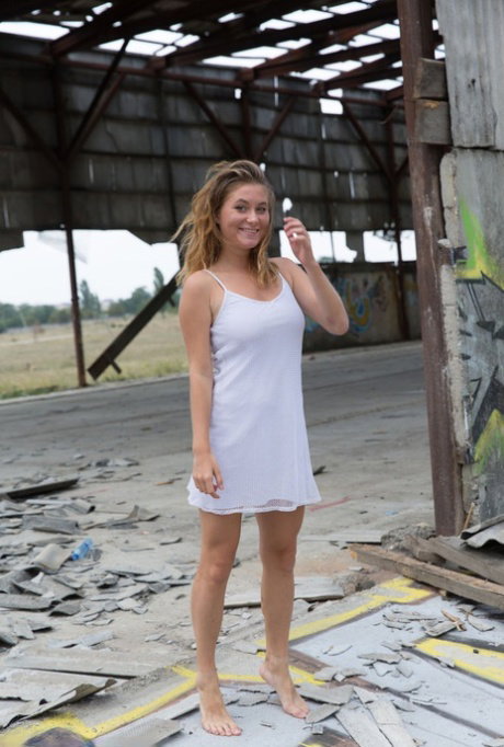 Teen solo girl Anel models totally naked amid ruins of abandoned building