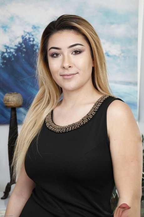 Chubby teen Serena Skye removes her black dress and flaunts her big tits
