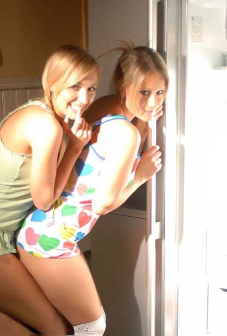 Blond chick Hayley Marie Coppin and her lesbian lover raid the fridge in socks