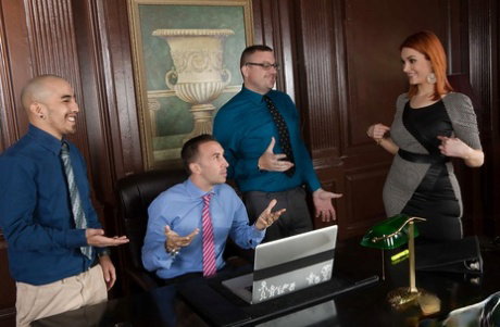 Redhead secretary Siri makes the office guys wild with her melons and skills