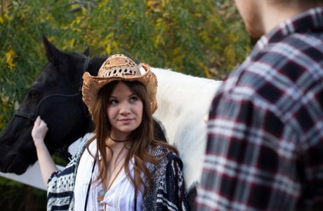 Brunette cowgirl Alison Rey gives a blowjob before taking a rod in her muff