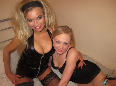 Busty blonde Blondie Blow and a girlfriend get on their knees for a double BJ