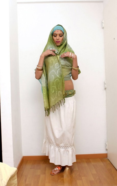 Pierced Indian solo model Tiziana posing non nude to flaunt her sexy body