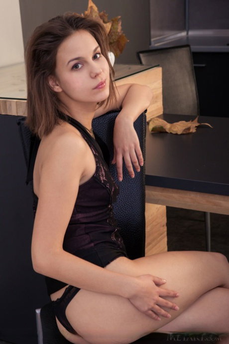Skinny babe freeing tiny teen tits and sexy ass from lingerie for glam pics