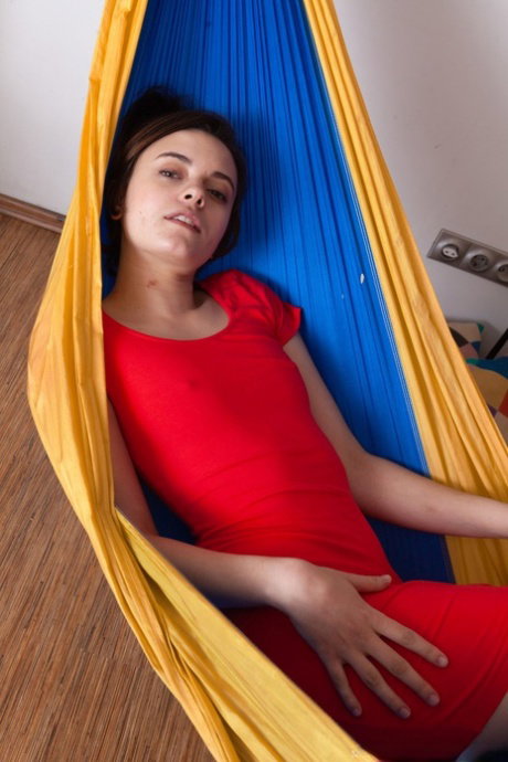 Young amateur Melody Sweet unveils & shows off her deliciously hairy pussy