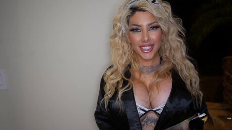 Big titted blonde Kitana Montana receives a cumshot on her fake tits during sex