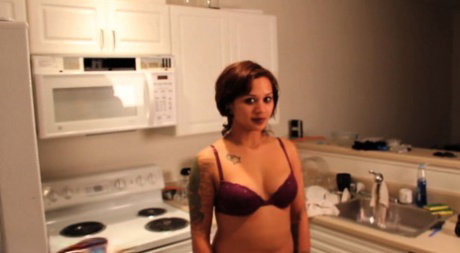 Cute brunette Sage participates in piss play while in a kitchen