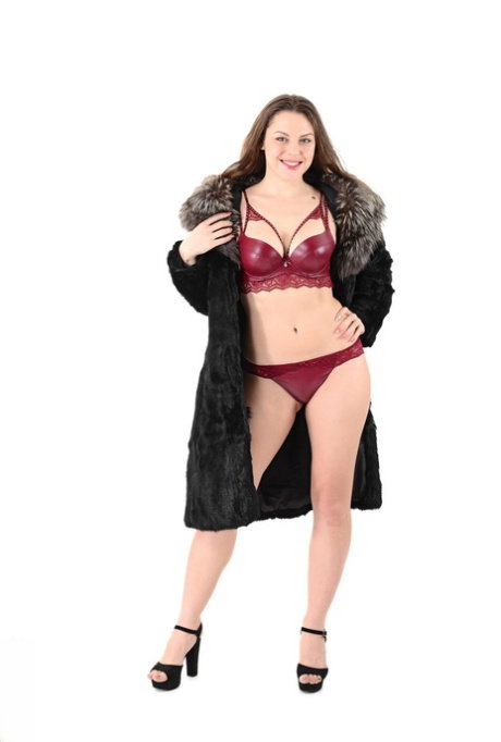 Curvy beauty Sofia Curly removes a fur coat and pretties before masturbating