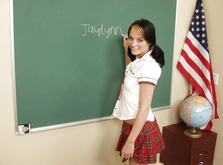 Nice looking schoolgirl teen Jaylynn undressing her cute body