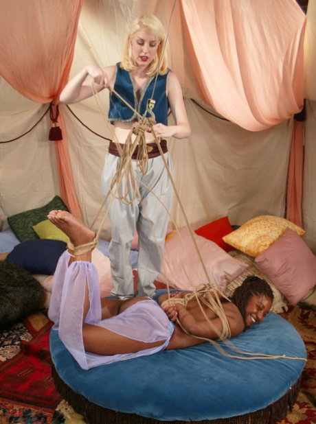 Bound ebony belly dancer Sia getting her pussy toyed by a blonde lezdom