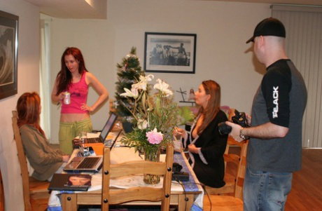 Amateur model Snowflake works a stripper pole in a thong and heels
