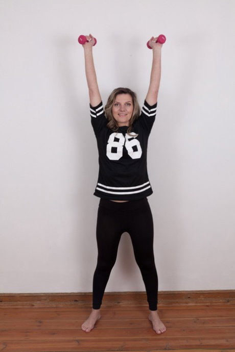 Superb chick Aga gets naked during workout and plays with her bush