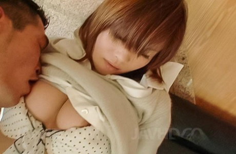 Japanese girl Manika sports cuffs while having sex with her man friend