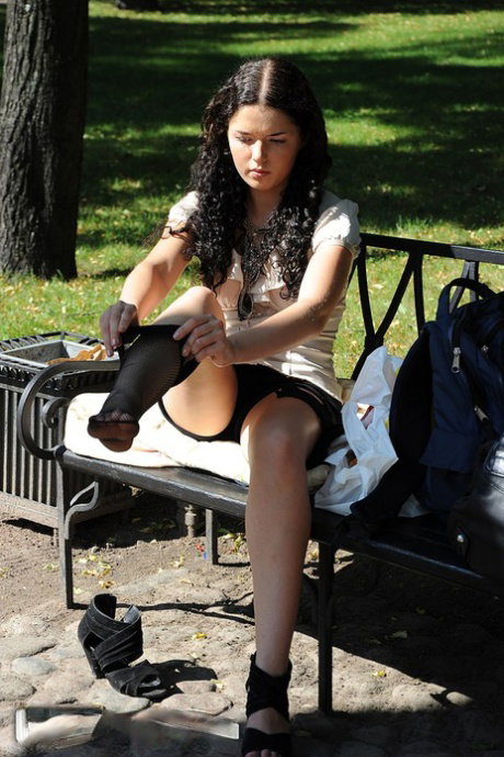 Brunette amateur Leonora flashers her tits before having sex in public place