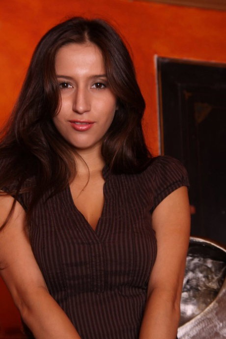 Latina girl April Oneil fingers her pussy during nude modelling premiere