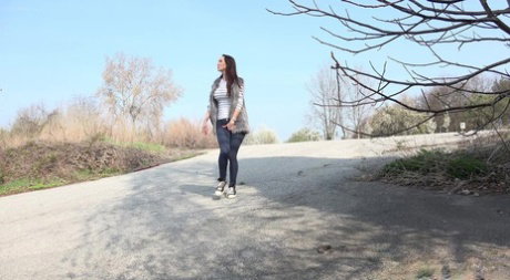 Cynthia Vellons pulls down her leggings on the road for an urgent piss
