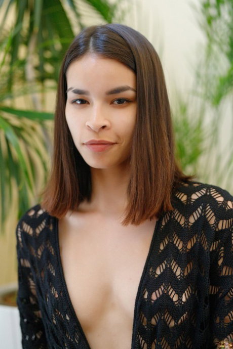 Petite teen Ryanne Keena models totally naked during solo action