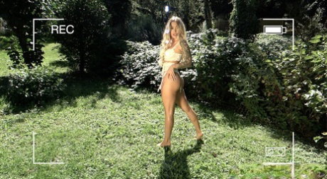 Hot blonde Misha Maver makes a homemade sex tape out on the lawn