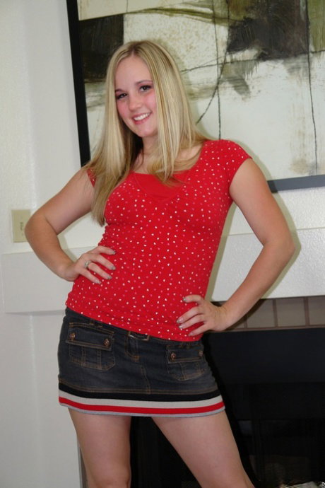 Trashy blonde girl Lynn Pleasant hikes her skirt to expose her printed panties