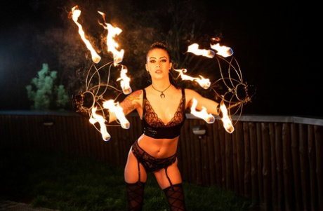 Fire performer Anna Deville partakes in interracial anal sex in latex gloves