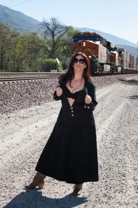 Curvaceous MILF with sunglasses Alicia Silver shows her hairy muff on railway