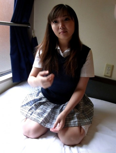 Japanese coed Haruka Ohsawa frees her full breasts before a POV blowjob