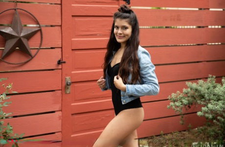 Sweet teen exposes her tiny tits in a backyard before getting naked indoors