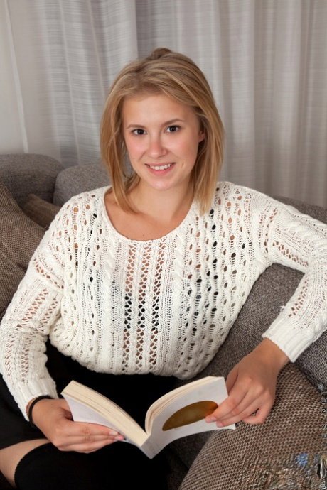 Young blonde girl Elza A makes her nude modeling debut in over the knee socks