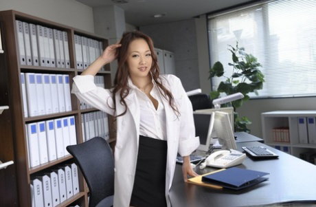 Japanese medical secretary Koi Miyamura gets mostly naked at work