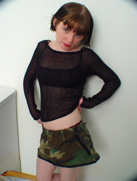 Charming teen Gwen does a slow striptease in a casual manner