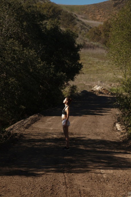 Teen babe Christine Ash strips her clothes & shows her hot body while hiking