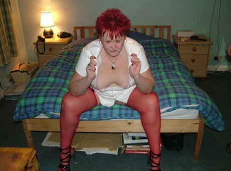 Mature nurse with red hair Valgasmic Exposed indulges in foreplay with a sissy