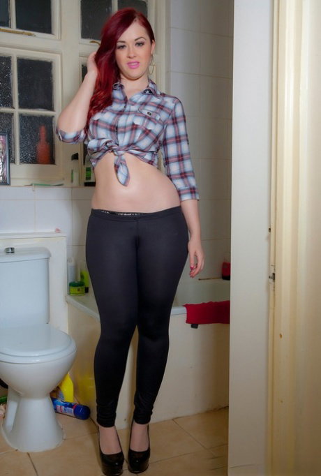 Hot young Jessica Dawson undressing in the bathroom to stretch her sexy body