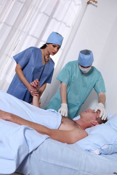 Naughty nurse Abbie Cat gets her horny pussy serviced by a patient's huge cock