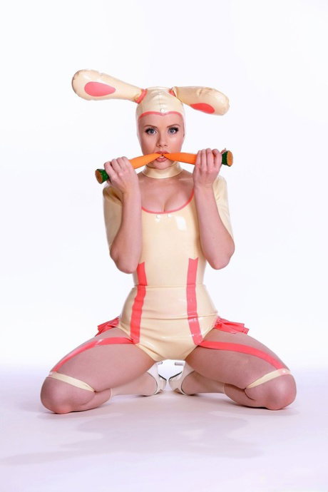 Glamour model Mosh dresses as a slutty Easter bunny in latex before striptease