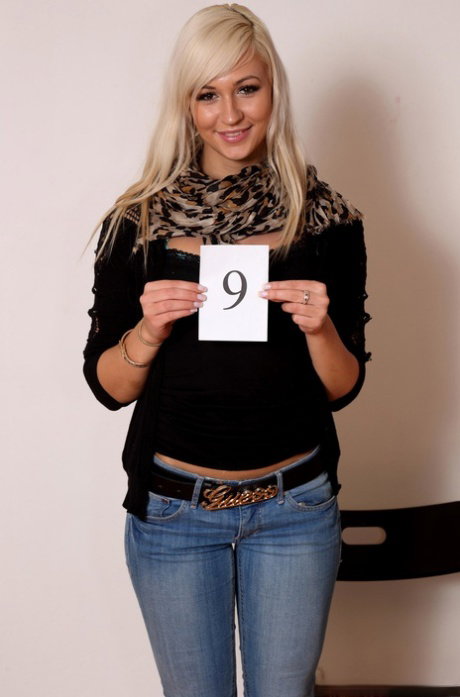 Sweet shapely blonde teen poses seductively after stripping for casting call