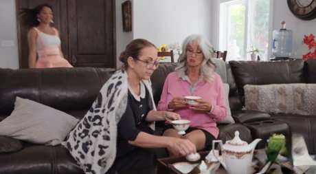 Old platinum blonde Sally DAngelo has lesbian sex with teen Malina Melendez
