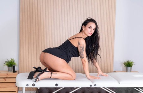 Latina teen Claudia Bavel gets banged by her heavily tattooed masseur