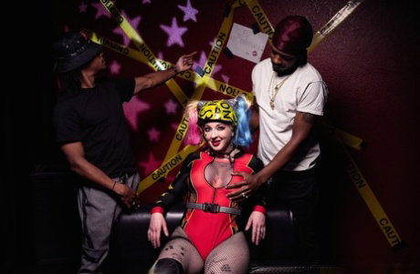 Sexy pornstar in a helmet Leya Falcon gets blacked by two horny dudes
