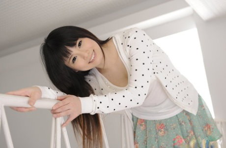 Japanese beauty Miyu Shiina goes topless while wearing white underwear