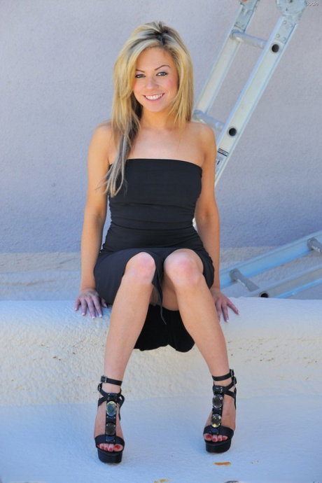 Blonde honey Jodie reveals her fine titties and masturbates in heels