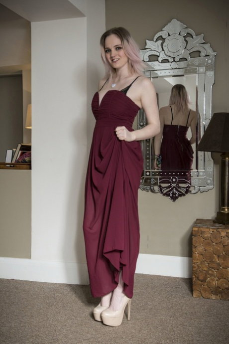 Busty long legged chick Carly Rae poses in sexy lingerie and high heels