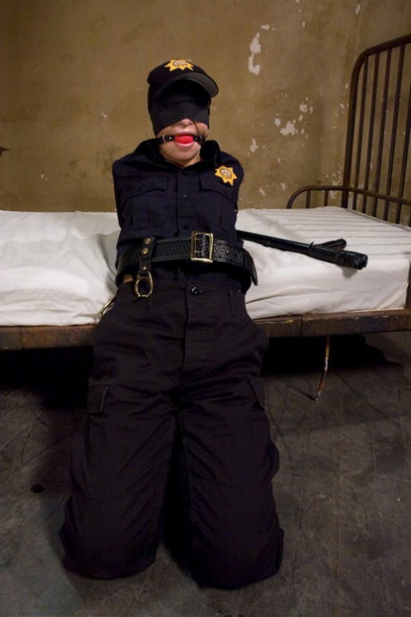 Lesbian couple have an electrical BDSM session with policewoman Amber Rayne
