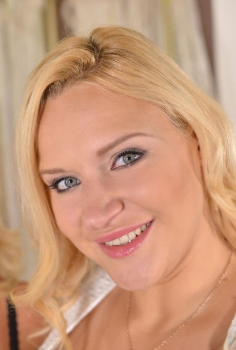 Busty lesbian Katie T. & her chesty Lithuanian GF toy & flaunt their big tits