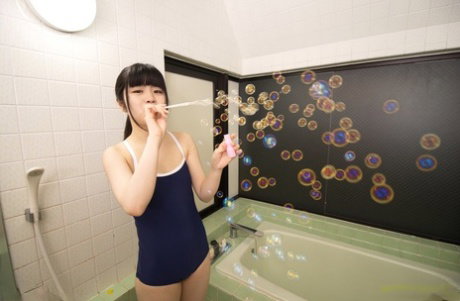 Adorable Japanese teen Otoka Aoki changes her attire in a safe for work manner