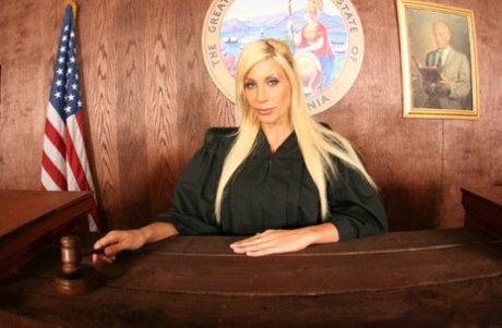 Tall blonde Puma Swede strips to reveal and touch her big fake tits
