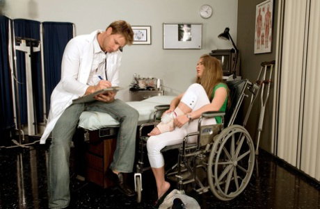 Wheelchair bound Megan Reece giving doctor footjob after cunnilingus