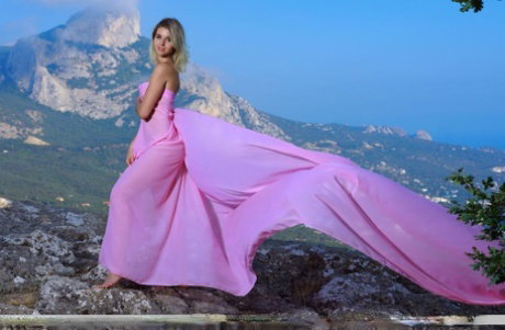 Gorgeous blonde teen Libby poses in the nude at high altitude