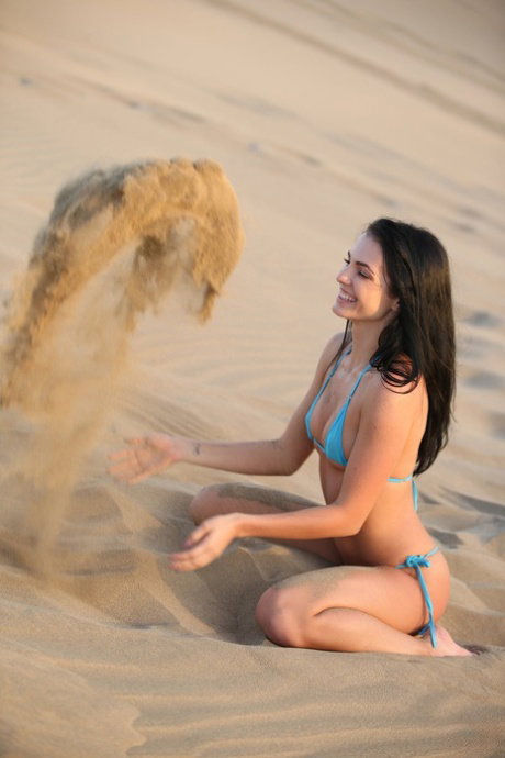 Teen solo girl with dark hair models naked all over the world