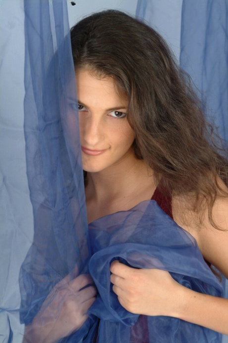 Amateur teen named Paulina takes off lingerie and shows skinny body